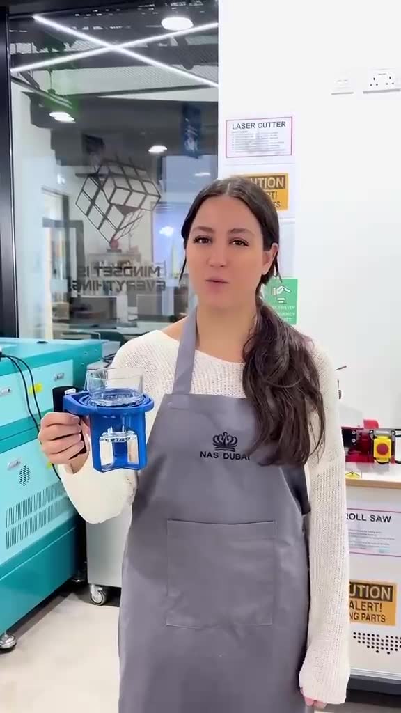 Selin explains and demonstrates ParkiCup in her school’s makerspace